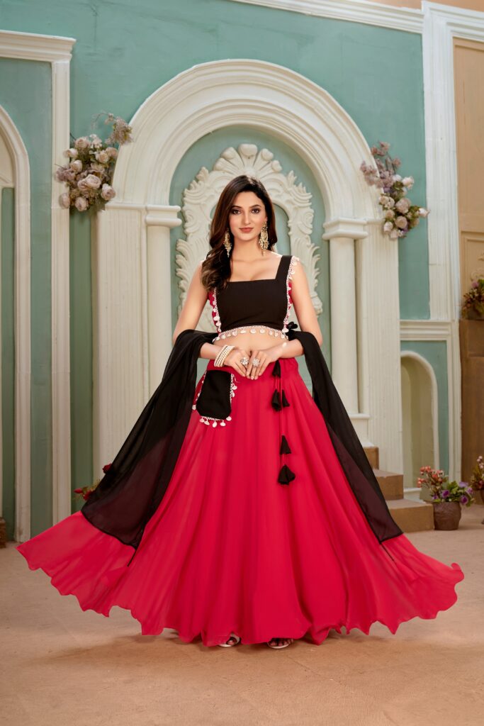 Red lehenga choli set with a sleeveless blouse, made of faux georgette, featuring tassels and latkans. Includes a matching dupatta and comfortable cotton blend inner fabric. Perfect for festive occasions